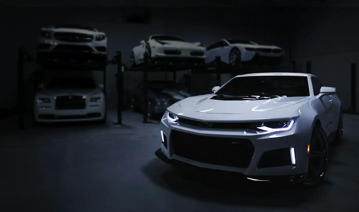 Cars in a garage. Illustrative photo, not this workshop.