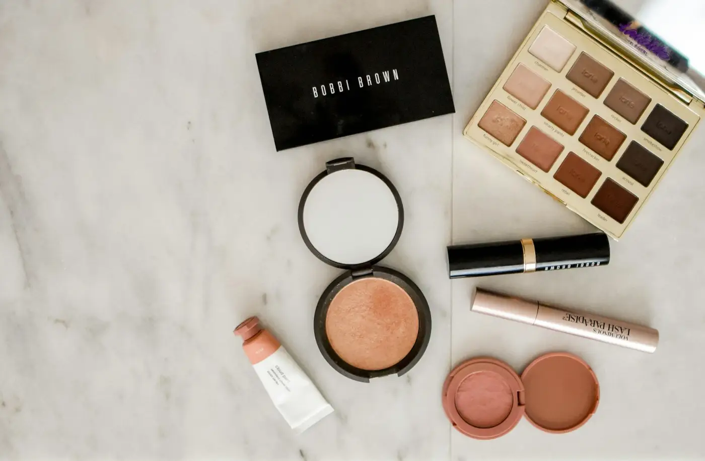 Makeup on marble. Illustrative photo.