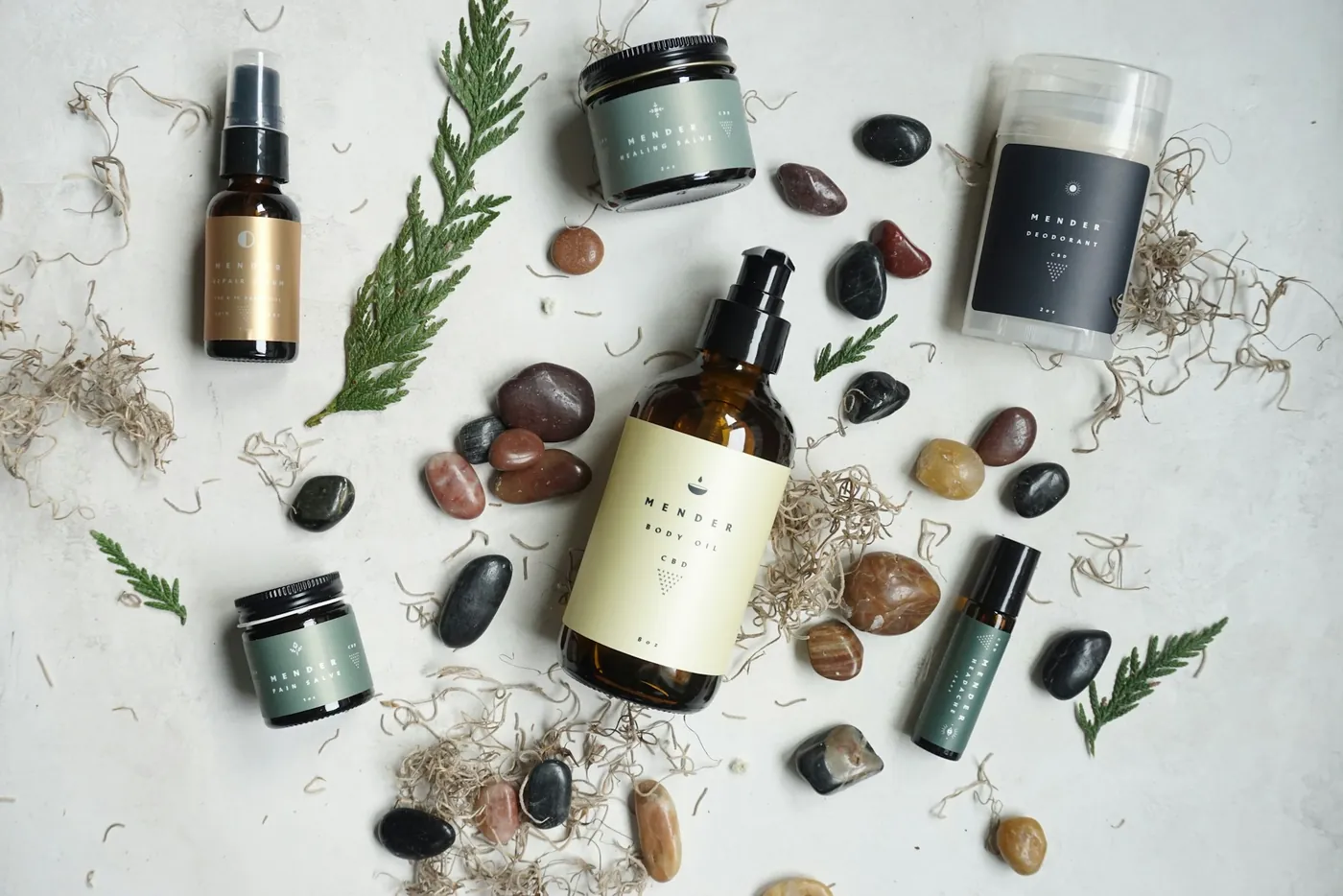 Skincare bottles and stones on a table. Illustrative photo.