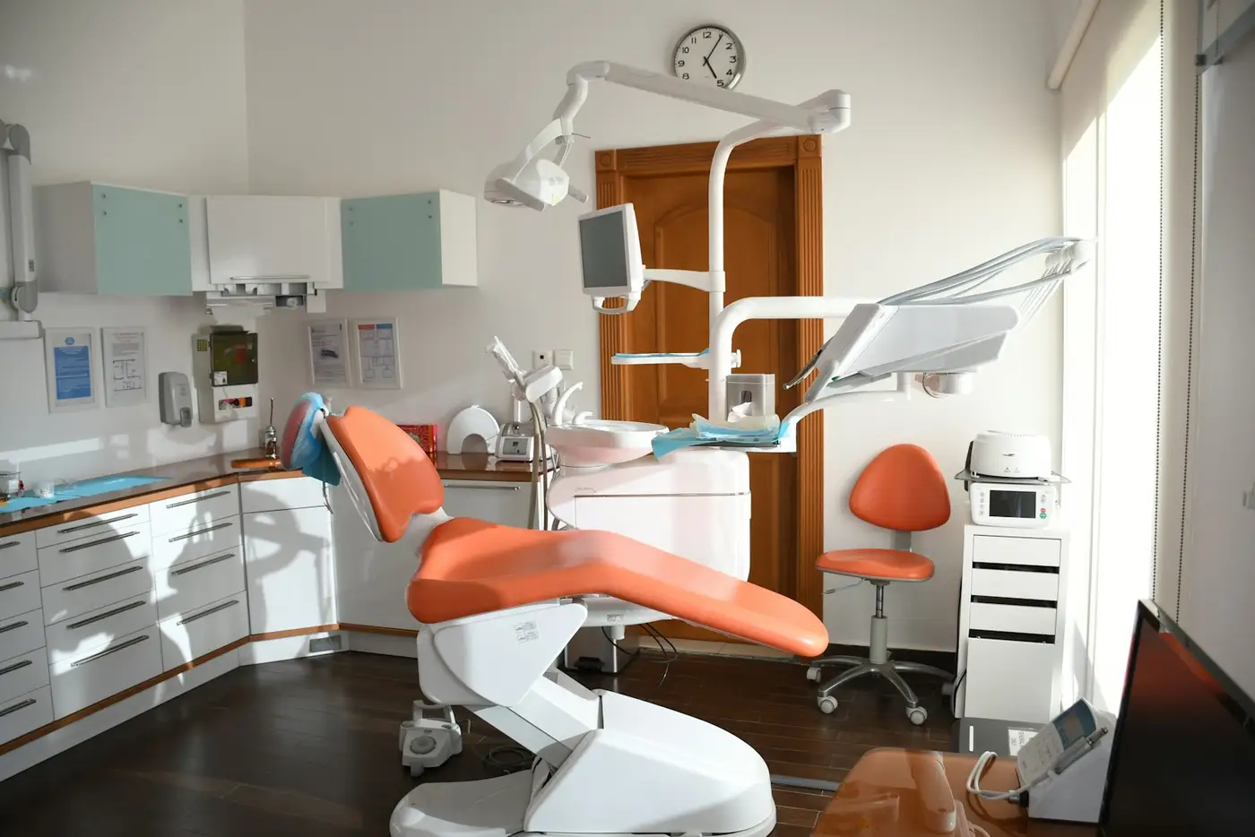 Dental chair in an empty room. Illustrative photo.