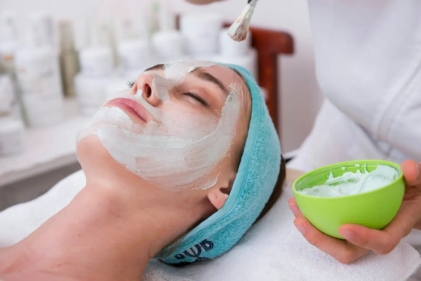 Facial treatment in a calm room. Illustrative photo, not a real client.